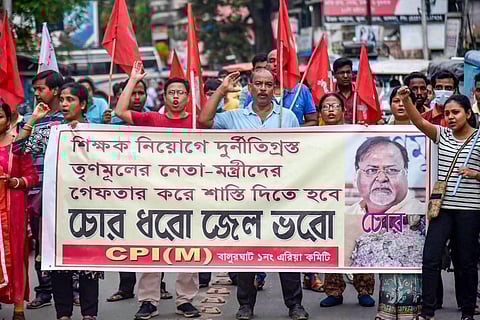 CPI(M) activists stage a protest demanding resignation of West Bengal Chief Minister Mamata Banerjee, following the arrest of Partha Chatterjee in the SSC scam case.  (Photo | PTI)