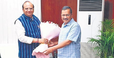 Delhi Lt Governor Vinai Kumar Saxena with Chief Minister Arvind Kejriwal (Photo |PTI)