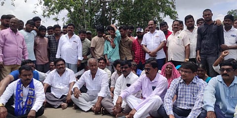 Villagers staged a protest at Rajupeta on the Bhadrachalam to Cherla road. (Photo| EPS)