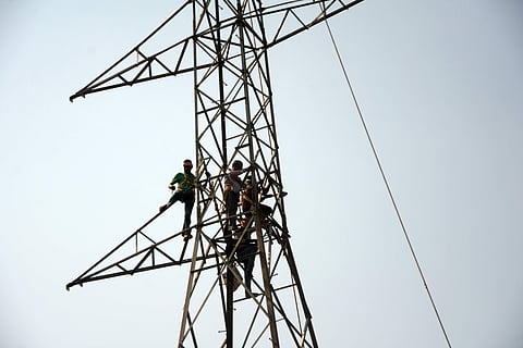'Mentally sick' man climbs high tension electric tower in Vijayawada, rescued