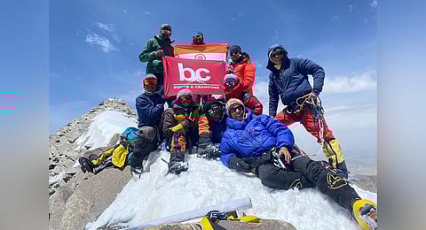 The team of Indian mountaineers on the summit.