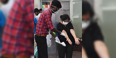 Health workers screening passengers for monkeypox symptoms at Chennai airport on Sunday | Ashwin prasath