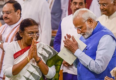 President Droupadi Murmu with Prime Minister Narendra Modi during her oath ceremony in the Central Hall of Parliament, in New Delhi. (Photo | PTI)