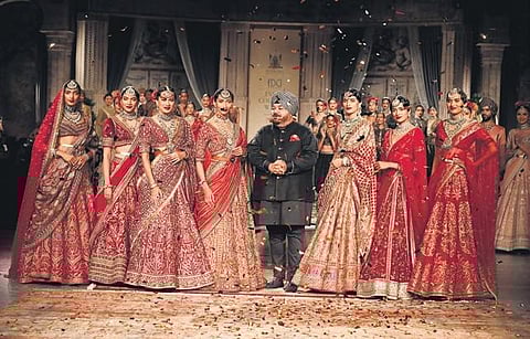 Fashion designer JJ Valaya (centre) with models showcasing his collection ‘Alma’ in the city on Sunday.