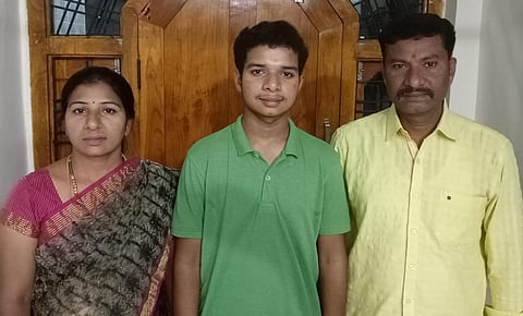 Pandula Varshith celebrates his remarkable success in Class 10 exams with his parents at Hayatnagar on Tuesday. (Photo | Express)