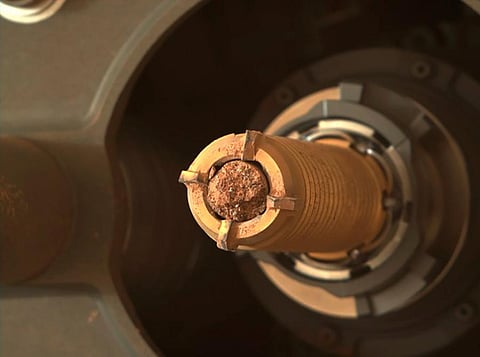 This photo provided by NASA shows a rock collected by the Perseverance rover on Mars. (Photo | AP)