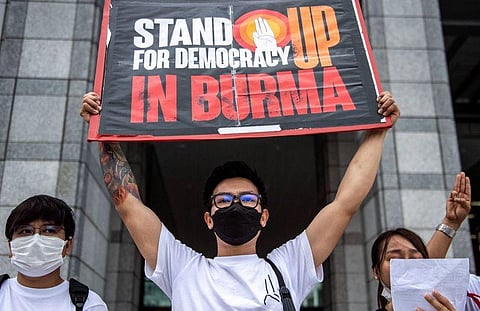 Demonstrators protest against Myanmar's execution of four pro-democracy activist at a rally outside the United Nations University in Tokyo on Tuesday. (Photo | AFP)