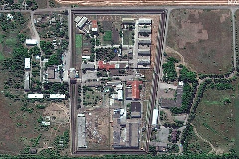In this satellite photo provided by Maxar Technologies, a view of the Olenivka detention center, in Eastern Donetsk province, after an attack on the prison. (Photo | AP)