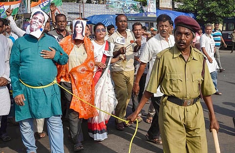 Congress activists take part in a protest rally against West Bengal Minister Partha Chatterjee and SSC scam case, in Kolkata, Saturday, July 30, 2022. (Photo | PTI)
