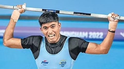Sanket Sargar reacts as he competes in the men’s 55kg category weightlifting event | PTI