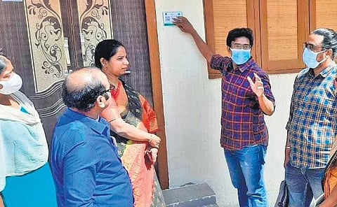 Urban Rebox employees explain their system to residents in Hyderabad