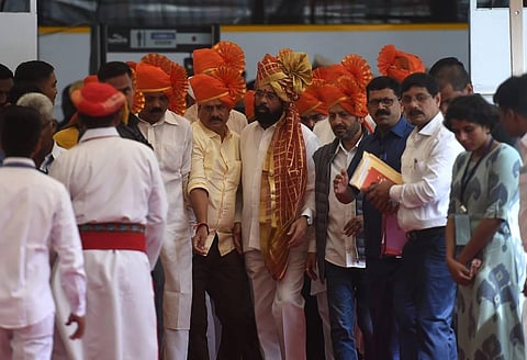 Maharashtra CM Eknath Shinde along with rebel Shiv Sena MLAs arrives for a special session of Maharashtra Assembly, at Vidhan Bhavan in Mumbai. (Photo | PTI)