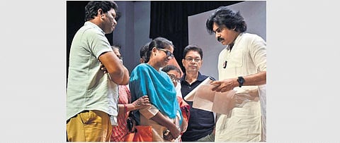 Jana Sena chief Pawan Kalyan receives grievances from people after launching the Jana Vani programme in Vijayawada on Sunday I Prasant Madugula