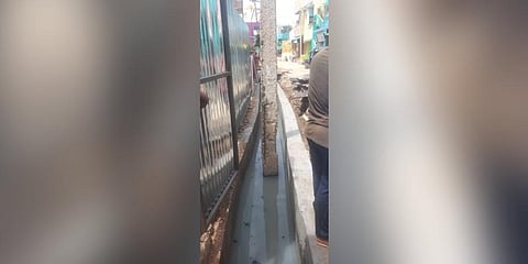 Electric poles on drainage channel in Ambur irks residents 