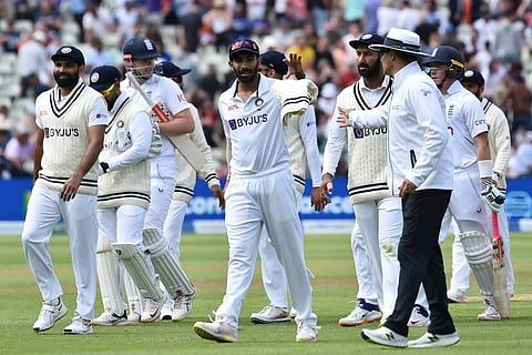 Players walk off the field for tea break during the fourth day of the fifth cricket test match between England and India at Edgbaston. (Photo | AP)
