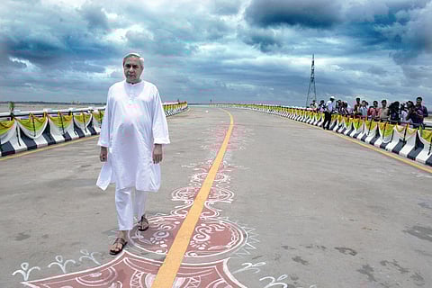 File image of Chief Minister Naveen Patnaik taking a stroll on Netaji Subhas Chandra Bose bridge over Kathajodi river in Cuttack, in July 2017. (File | Express)