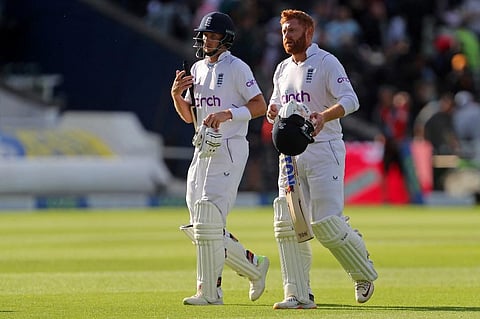 England's Joe Root (L) and England's Jonny Bairstow walk back to the pavilion on Day 4 of the fifth cricket Test match between England and India at Edgbaston, Birmingham. (Photo | AFP)