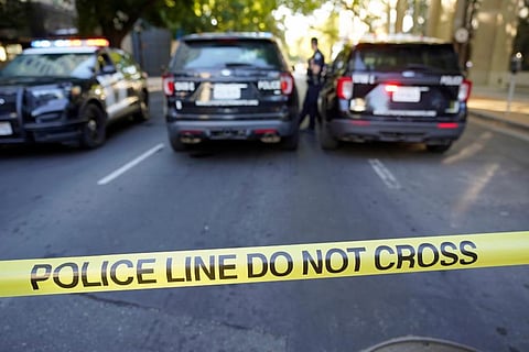 A police barricade blocks the street near the scene of a fatal shooting that also injured others outside of a downtown in Sacramento, night club in the early morning hours. (Photo | AP)