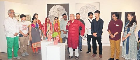 The artists with Akhilesh (first left) and (in front, in red) Ashok Vajpeyi, Indian poet and trustee of The Raza Foundation, at the inauguration of the exhibition.