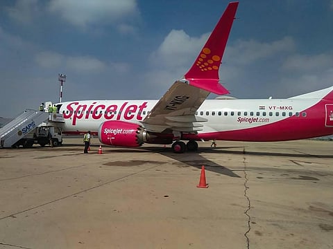 Dubai-bound SpiceJet Boeing 737 Max aircraft after its landing following a fuel indicator malfunction, at Karachi Airport. (Photo | PTI)