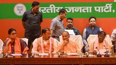 NDA's presidential candidate Droupadi Murmu with Union Minister Smriti Irani, UP CM Yogi Adityanath and UP Deputy CM K.P. Maurya during a meeting to seek support for her. (Photo | PTI)