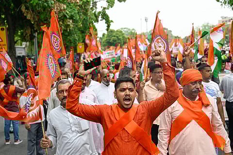 Members of various Hindu organisations shout slogans during a 'Sankalp March' from Mandi House to Jantar Mantar, in New Delhi, Saturday, July 9, 2022. (Photo | PTI)