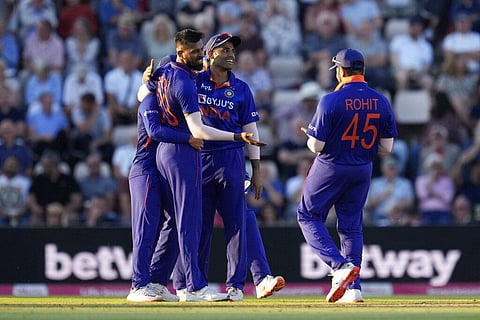 India's Hardik Pandya, third right, celebrates taking the wicket of England's Dawid Malan during the first T20 international. (Photo | AP)