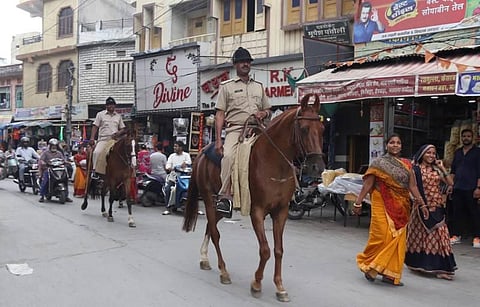Security personnel patrol during a four-hour relaxation in the curfew imposed by administration to maintain law and order after the murder of tailor Kanhaiya Lal, in Udaipur. (Photo | PTI)