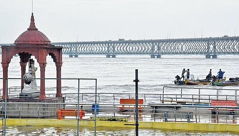 The flooded Godavari River at Saraswathi ghat at Rajamahedravaram in Andhra Pradesh on Saturday. (Photo | Express)