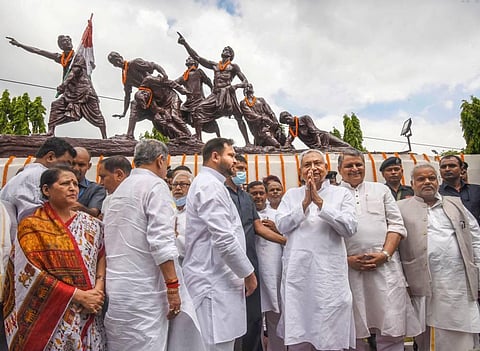 Bihar Chief Minister Nitish Kumar along with Deputy CM Tejashwi Yadav after paying tributes at the statues of Bihar's Quit India Movement martyrs. (Photo | PTI)