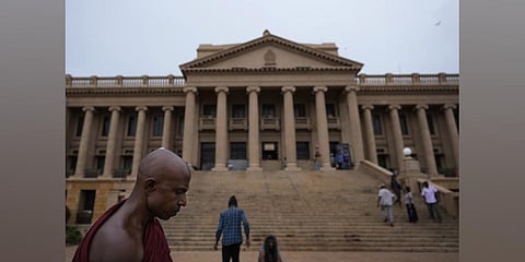 A Sri Lankan government minister on Wednesday, Aug. 10, submitted to Parliament a constitutional amendment bill that would clip the powers of the president. (Photo | AP)