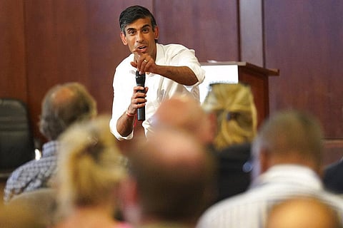 Rishi Sunak talks to a group of people during a visit to St John's Wood Synagogue. (Photo | AP)