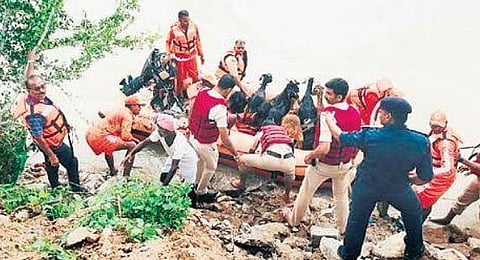 NDRF team rescues scores of sheep and two shepherds in Gangavati taluk of Koppal district on Friday | Express