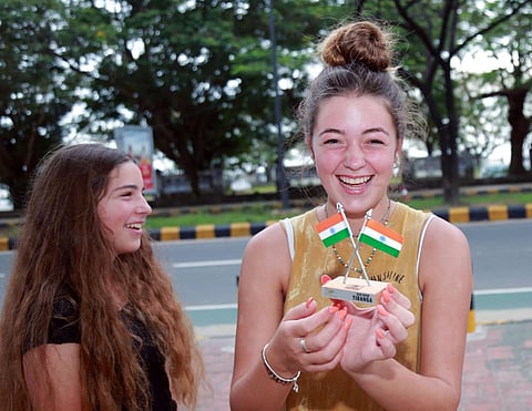 A tourist group from Israel was seen overjoyed with the Indian flag they received as part of the 'Har Ghar Tiranga' campaign in Kerala's Kochi. (Photo |TP Sooraj, EPS)
