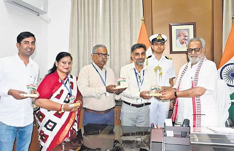 Governor of Odisha Prof Ganeshi Lal receiving the Tricolour as part of the Har Ghar Tiranga Abhiyaan by The New Indian Express, in Bhubaneswar on Saturday