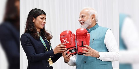 Prime Minister Narendra Modi with boxer Nikhat Zareen during the felicitation ceremony of the Indian contingent for the Commonwealth Games 2022.(Photo | PTI)