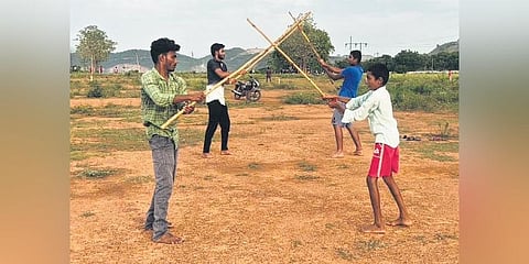 Children and young men practice karra samu, at Mangampeta in Annamaiah district | Express