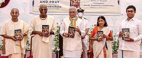 Governor Arif Mohammad Khan and Aswathy Thirunal Gowri Lakshmi Bayi of the Travancore royal family releasing the book ‘Sing, Dance and Pray: The Inspirational Story of Srila Prabhupada’ at an event he