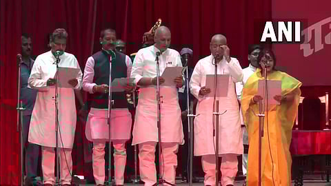 The newly inducted ministers take oath on Tuesday. (Photo | ANI Twitter)