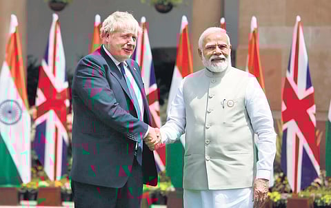 Britain’s PM Boris Johnson with his Indian counterpart Narendra Modi. (File Photo| Shekhar Yadav)