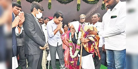 MAUD Minister KT Rama Rao felicitates a freedom fighter at the Independence Day celebrations in Rajanna-Sircilla district on Monday (Photo | Express)
