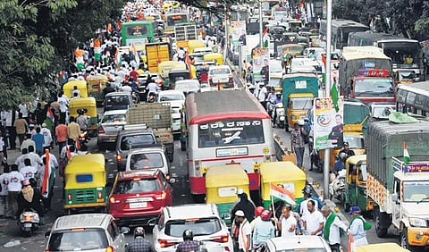 Traffic grinds to a halt in the Central Business District, due to the Congress’ Freedom Walk, in Bengaluru on Monday | Express