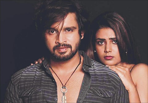 Kiran Raj and Surekha in a still from 'Sherr'.