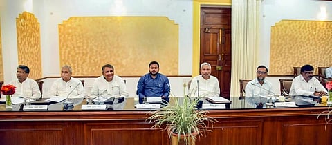 Bihar Chief Minister Nitish Kumar with Deputy Chief Minister Tejashwi Yadav and Cabinet Ministers during a meeting at Old Secretariat, in Patna. (Photo | PTI)