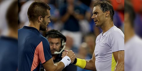 Borna Coric of Croatia is congratulated by Rafael Nadal of Spain after their match during the Western & Southern Open.(Photo | AFP)