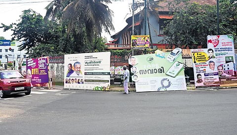Flex boards and hoardings placed on the footpath at Statue in Thiruvananathapuram|  Vincent Pulickal