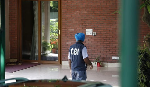 Economic Offences Unit  personnel leave with the accused arrested in connection with the alleged irregularities in NEET-UG exams 2024.