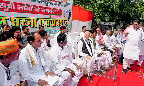 Prahlad Modi, brother of Prime Minister Narendra Modi, stages a protest at Jantar Mantar, in New Delhi, on August 2, 2022. (Photo | PTI)