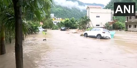 Water enters a hotel located on Maldevta road in Dehradun following incessant rains in the area. (Photo | ANI)