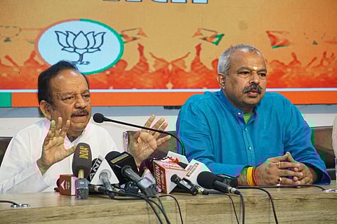 Former union minister Harsh Vardhan with Delhi BJP President Adesh Gupta addresses a press conference, in New Delhi. (Photo | PTI)